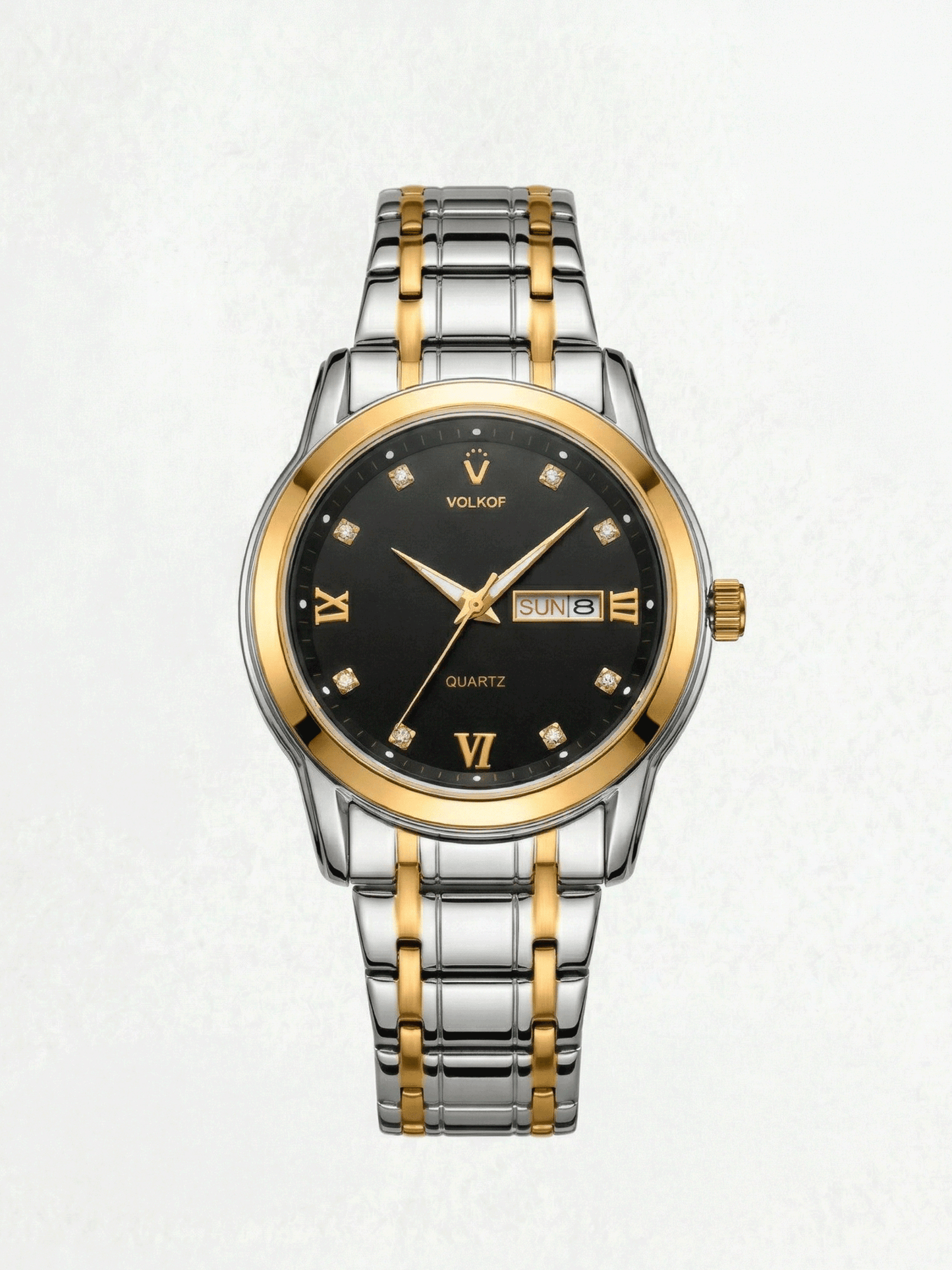Reloj analógico para hombre en acero inoxidable bicolor plata y oro, esfera negra con indicadores de cristal, números romanos dorados, ventana de fecha y caja de 42mm