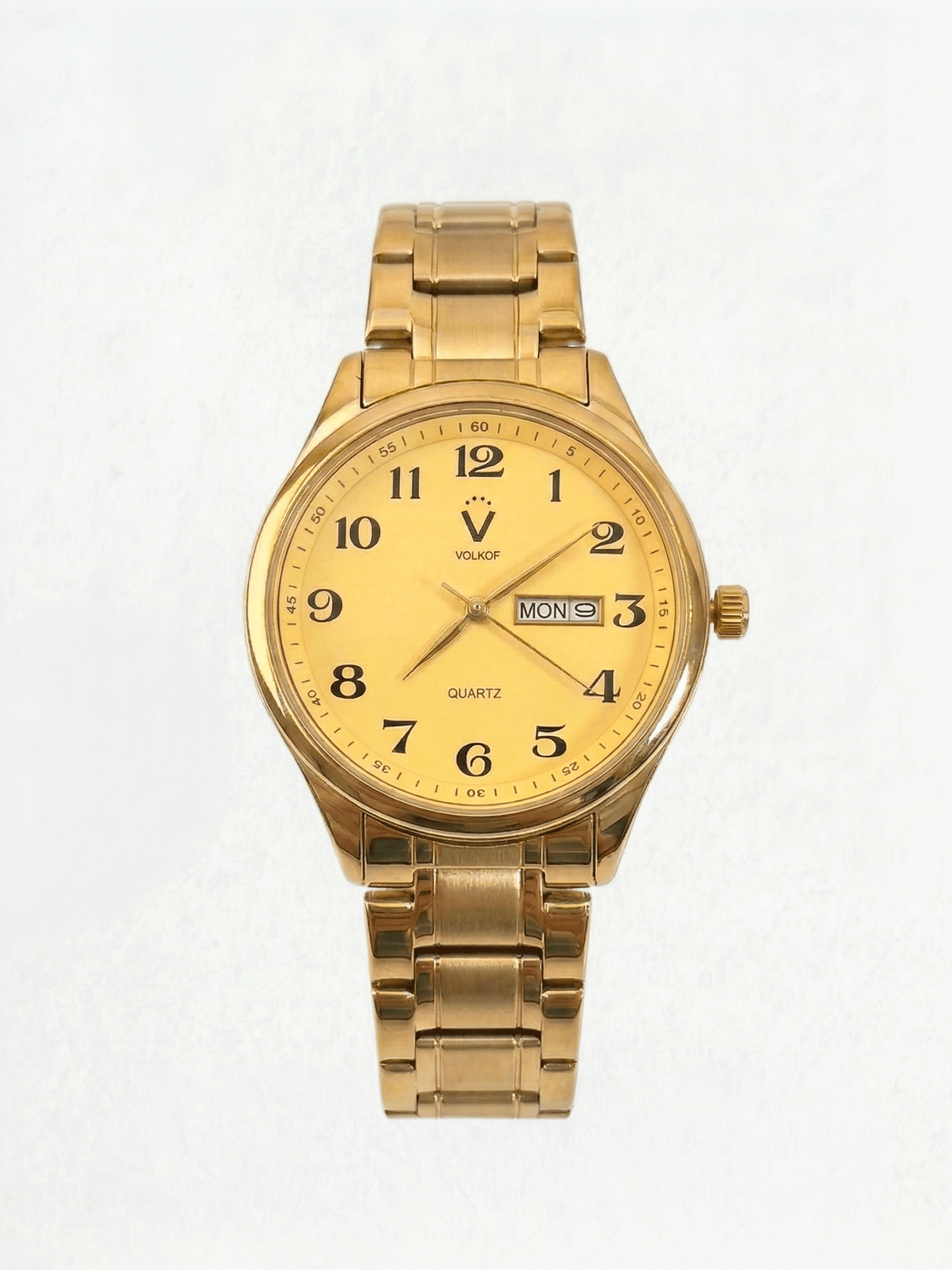 Reloj analógico para hombre en acero inoxidable dorado, esfera dorada con números arábigos, ventana de fecha y día, y caja de 42mm
