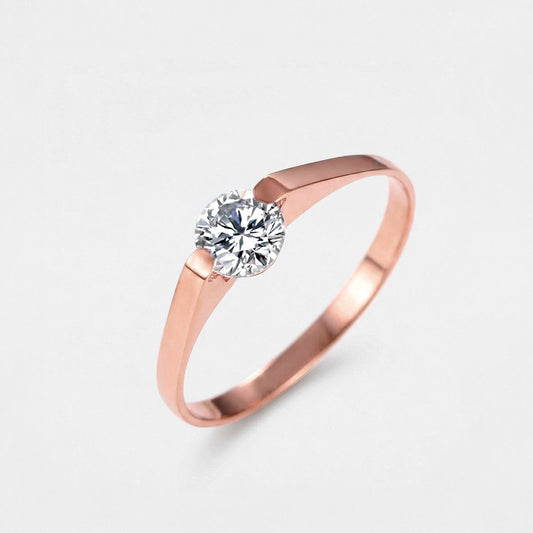 Anillo de compromiso para dama elegante de titanio con enchapado en oro rosa, con piedra solitario redondo de corte brillante, diseño minimalista y clásico, código 5180