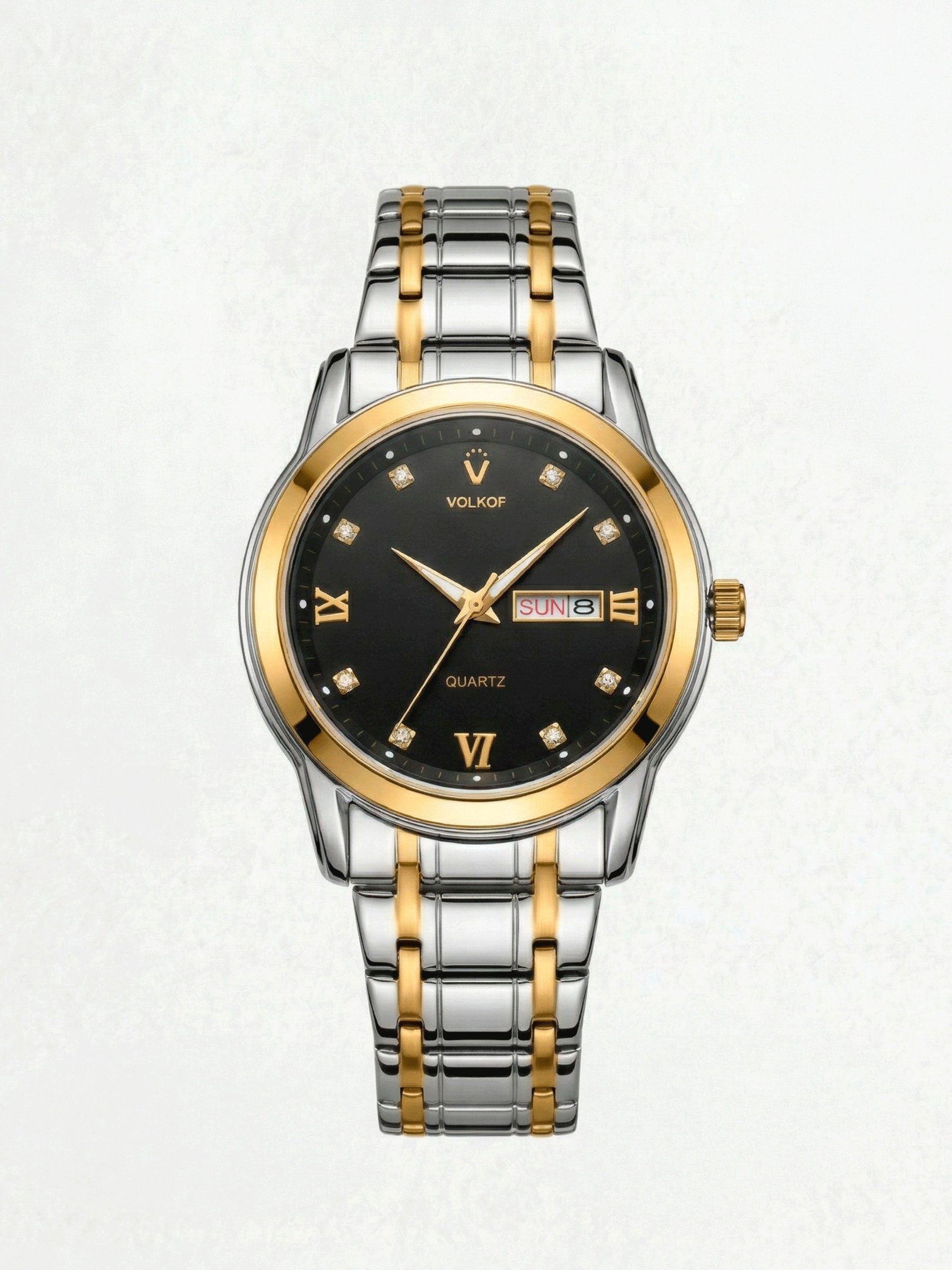 Reloj analógico para hombre en acero inoxidable bicolor plata y oro, esfera negra con indicadores de cristal, números romanos dorados, ventana de fecha y caja de 42mm