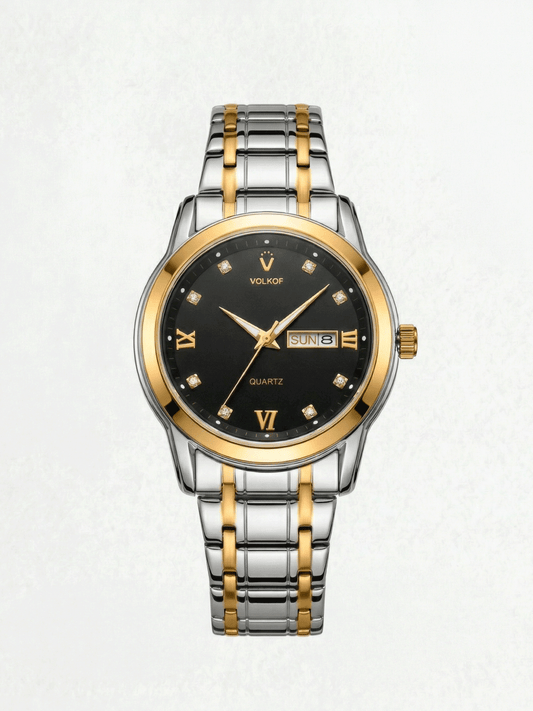 Reloj analógico para hombre en acero inoxidable bicolor plata y oro, esfera negra con indicadores de cristal, números romanos dorados, ventana de fecha y caja de 42mm