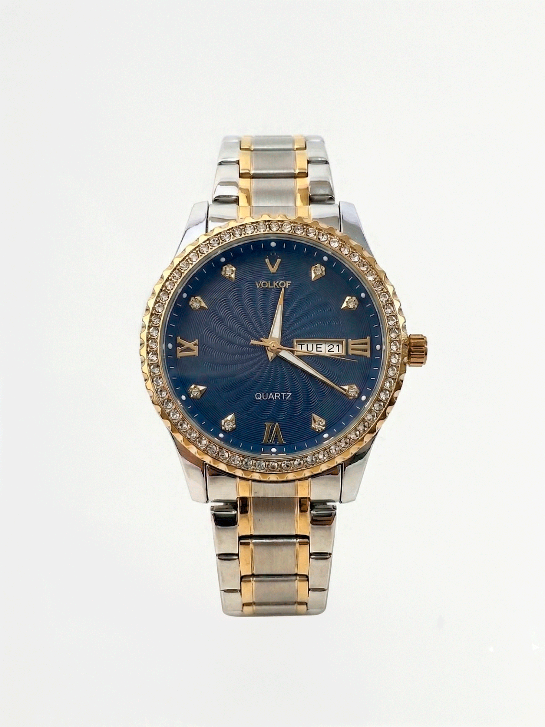 Reloj analógico para hombre en acero inoxidable bicolor plata y oro, con bisel de cristales brillantes, esfera azul oscuro con textura de ondas guilloché, índices de diamante, números romanos y ventana de fecha