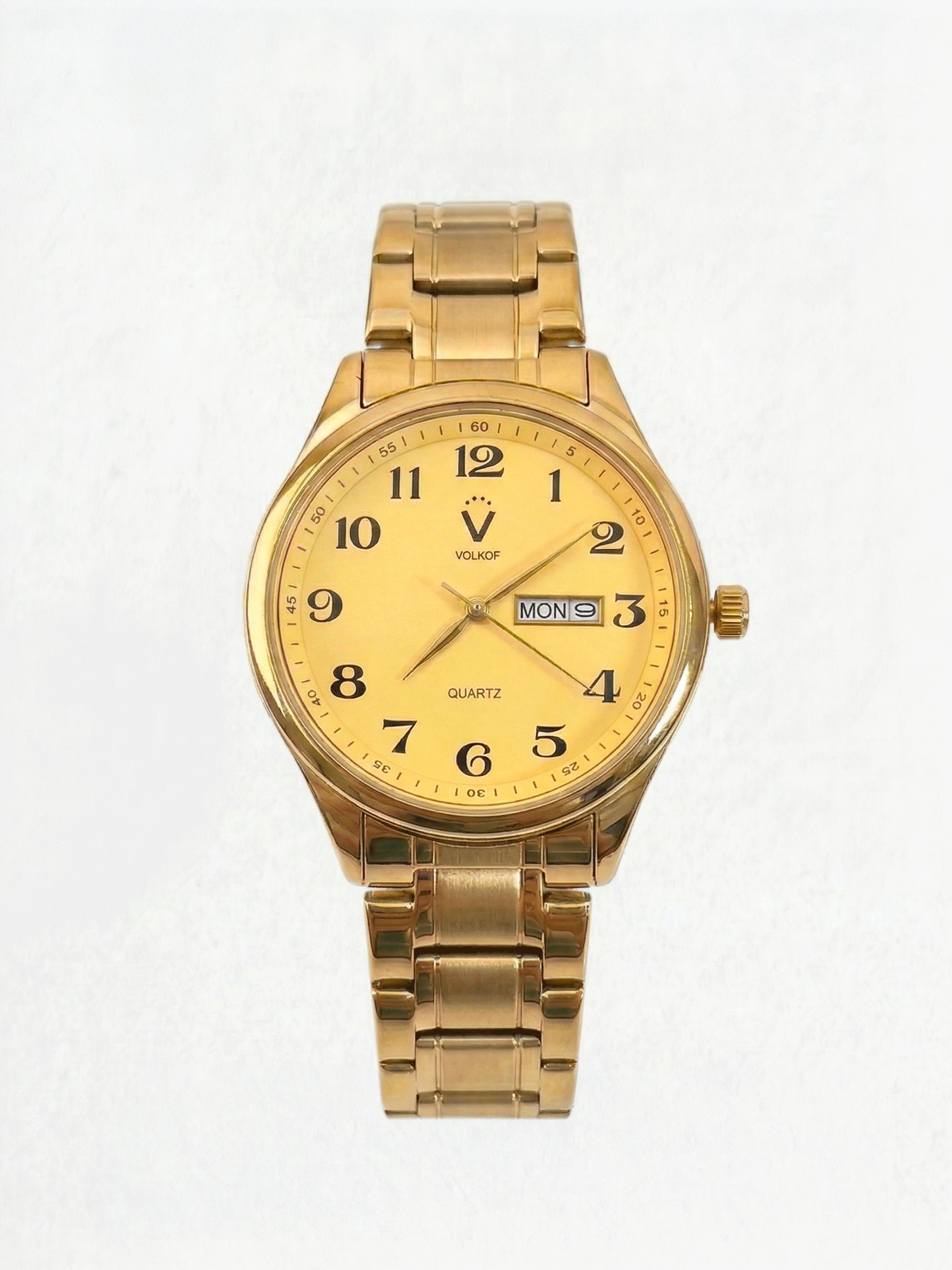 Reloj analógico para hombre en acero inoxidable dorado, esfera dorada con números arábigos, ventana de fecha y día, y caja de 42mm
